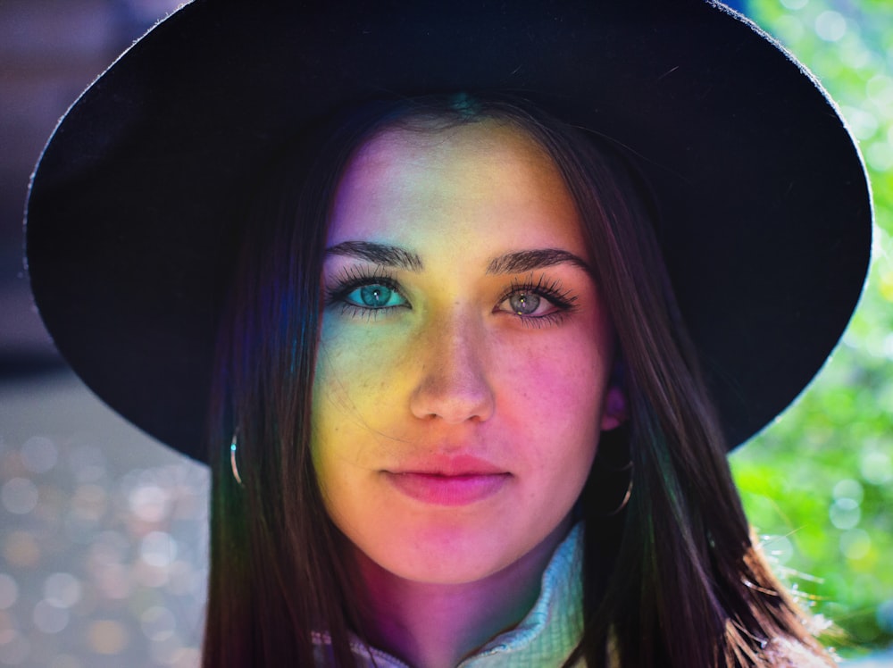 woman wearing black hat