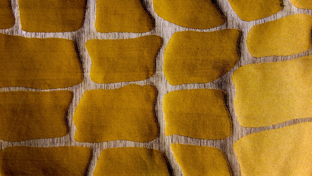 yellow and beown textile