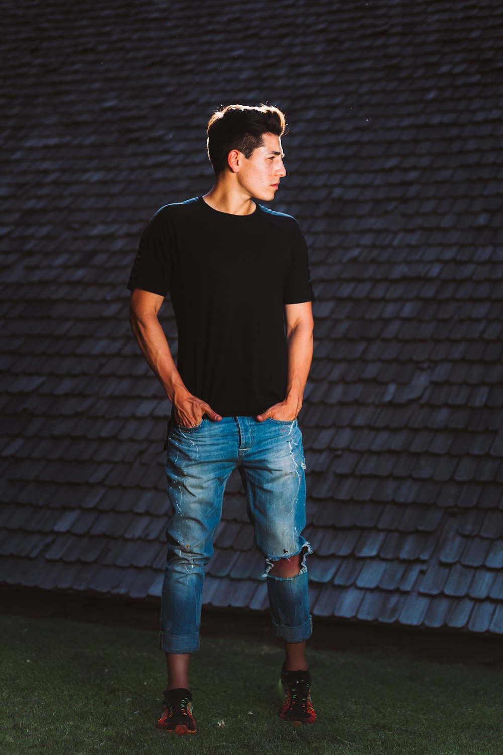 man standing near concrete bricks