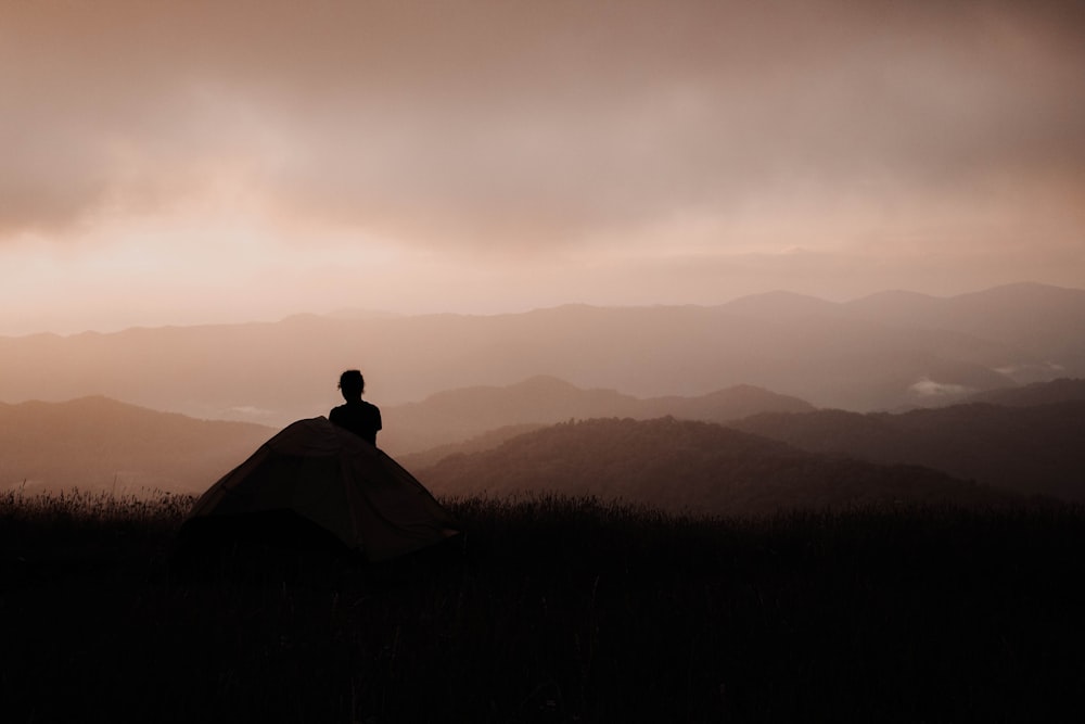 man looking at mountain