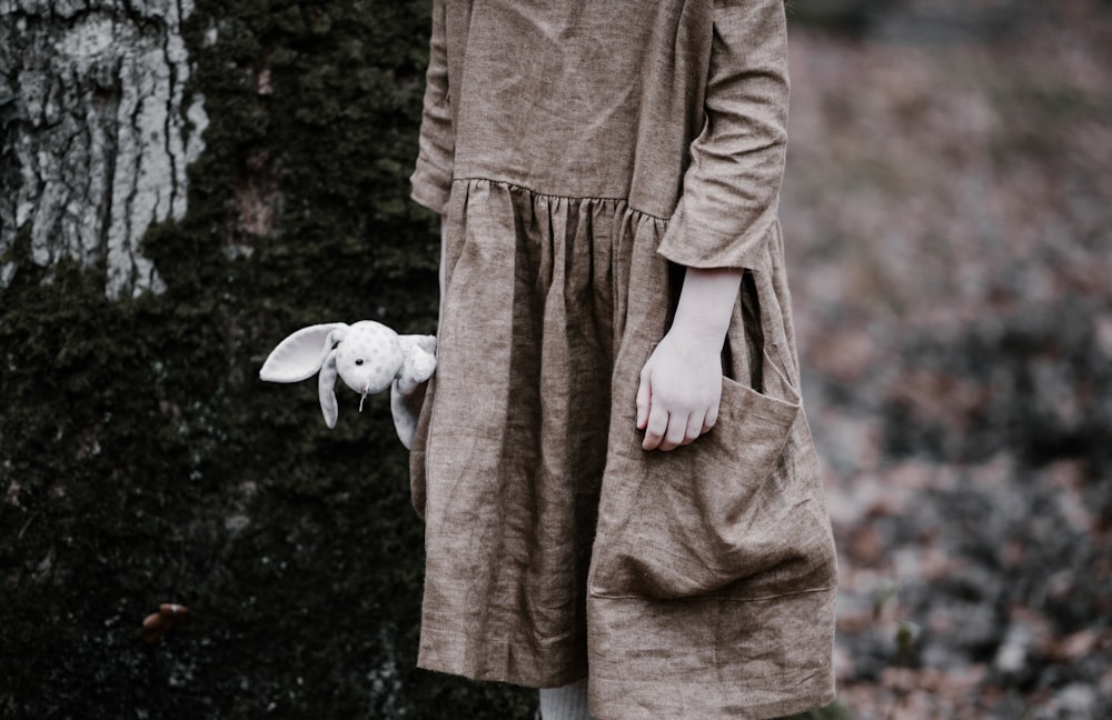 person holding rabbit