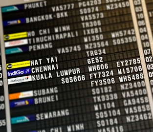 flight board highlighting Hat Yai, Chennai, and Kuala Lumpur