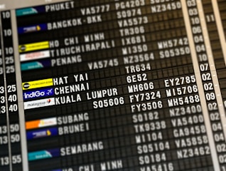 flight board highlighting Hat Yai, Chennai, and Kuala Lumpur