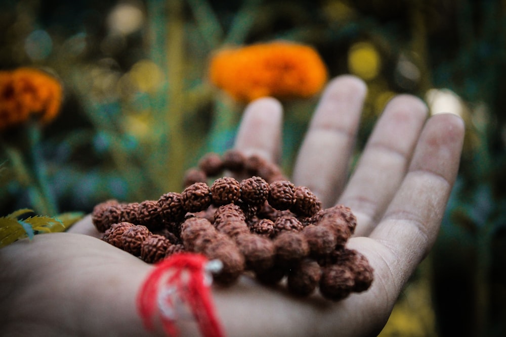 tesbih praying beads of person's left palm