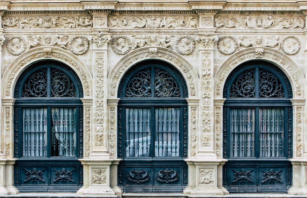 photo of brown and black concrete building