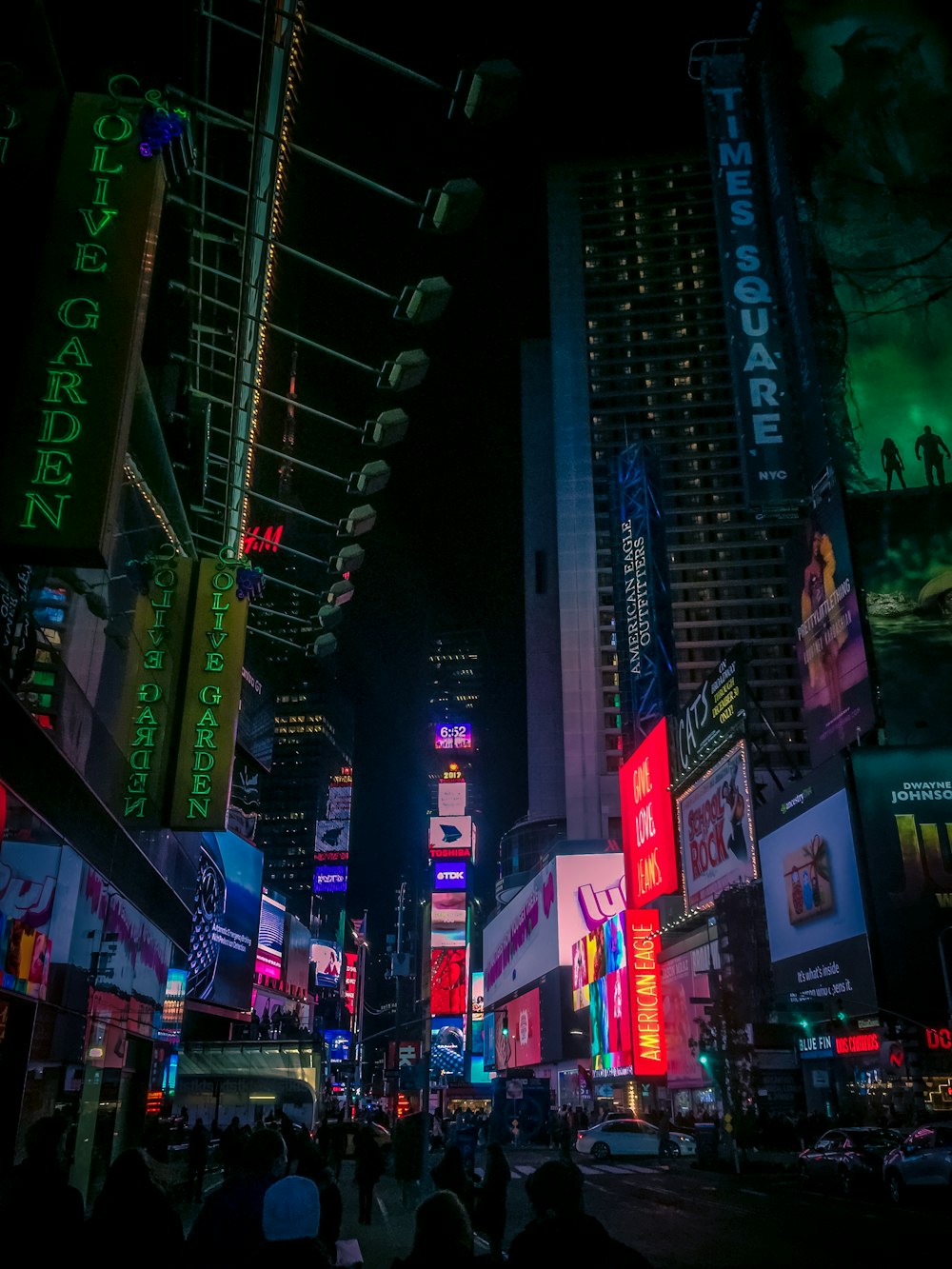 group of people walking on New York Timesquare during nighttime