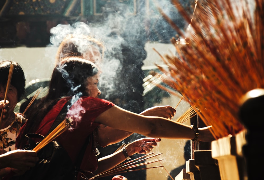 people putting incense