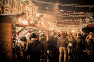 group of people standing near amusement park