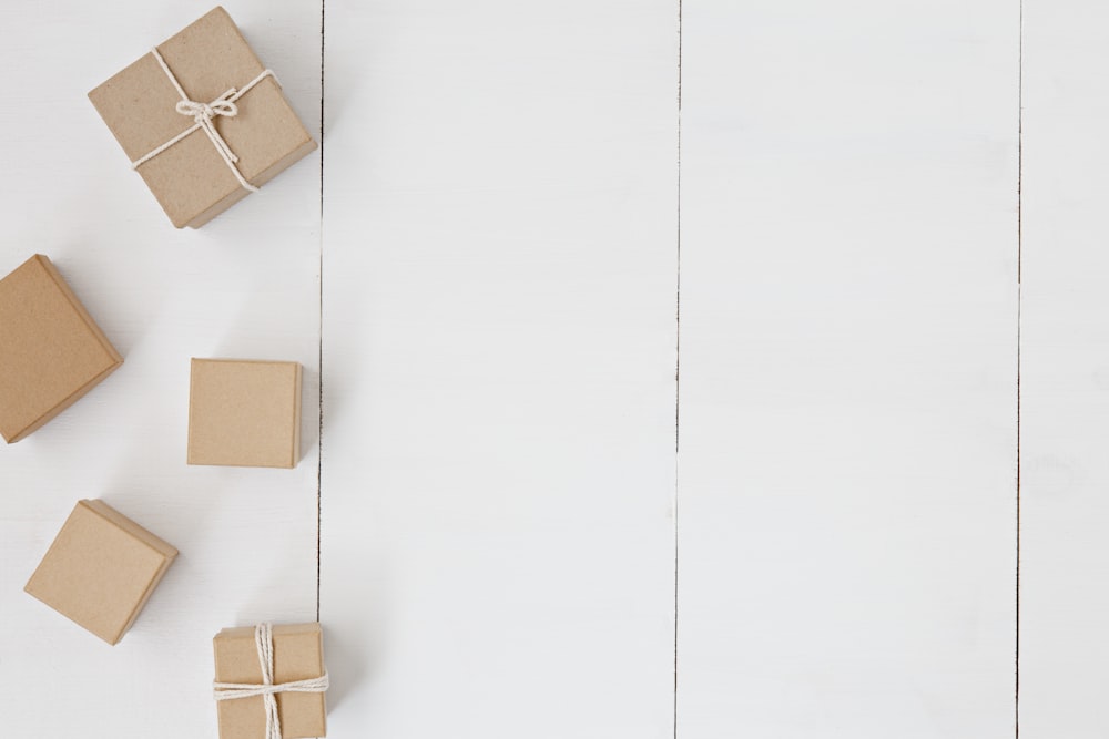 brown gift box on white surface