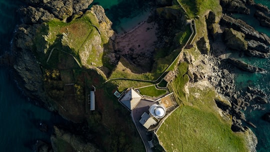 aerial photography of green field in Start Point Lighthouse United Kingdom