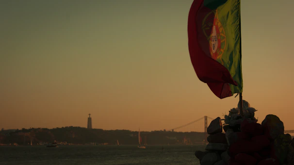 A sunset view of the association’s banner displayed at a local festival.