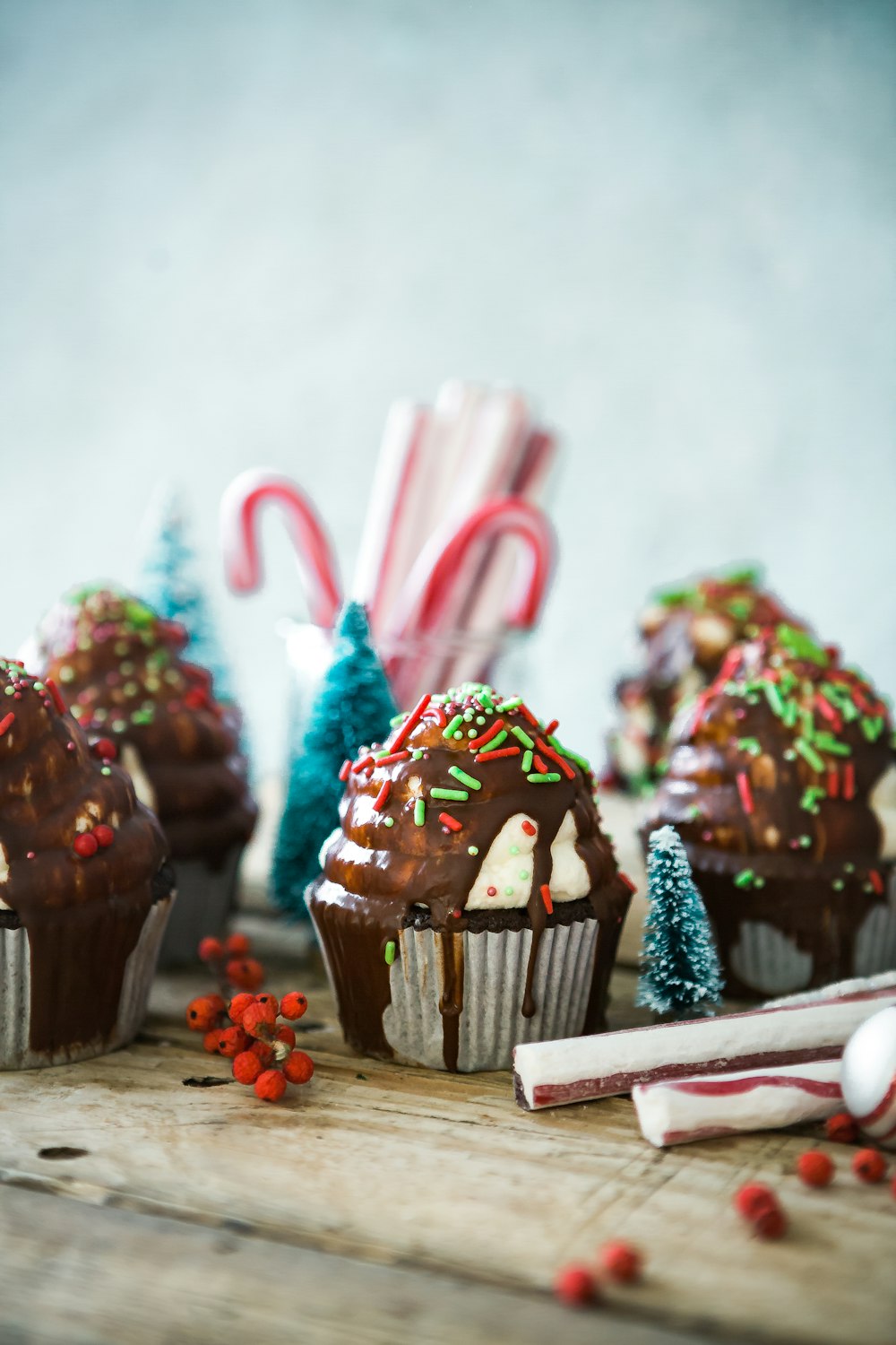 cupcakes with sprinkles on table