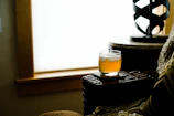 A cozy, inviting shot of a customer enjoying zenith9’s product in a sunlit local setting.