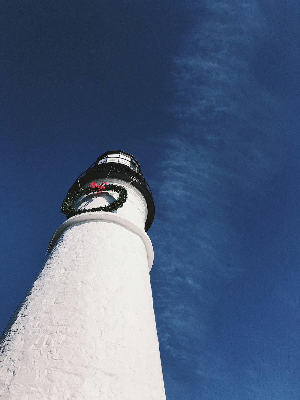 wormseye photography of white light house