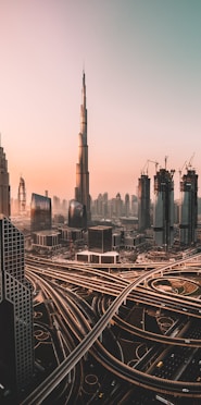 aerial photo of city highway surrounded by high-rise buildings