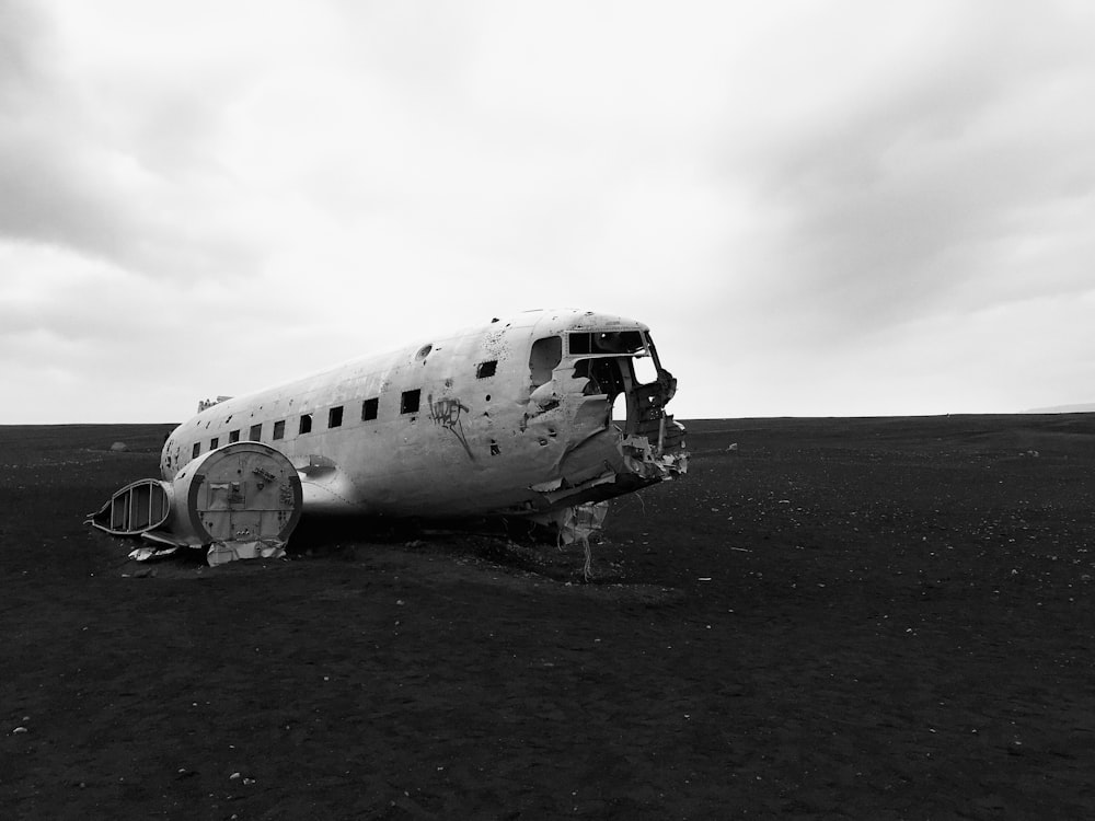 wrecked airplane on desert dune