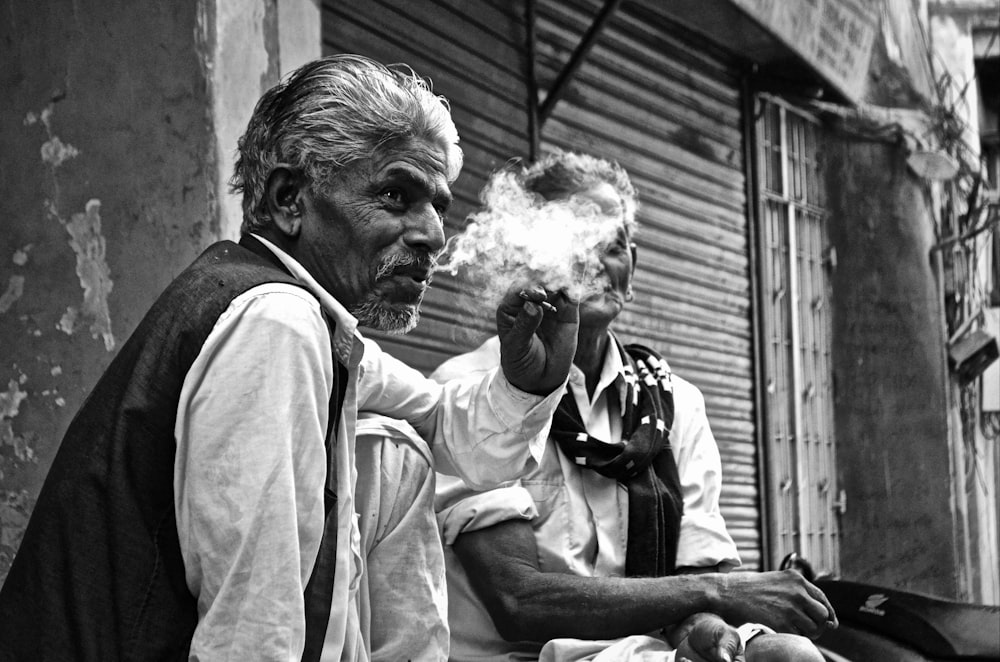 man smoking cigarette