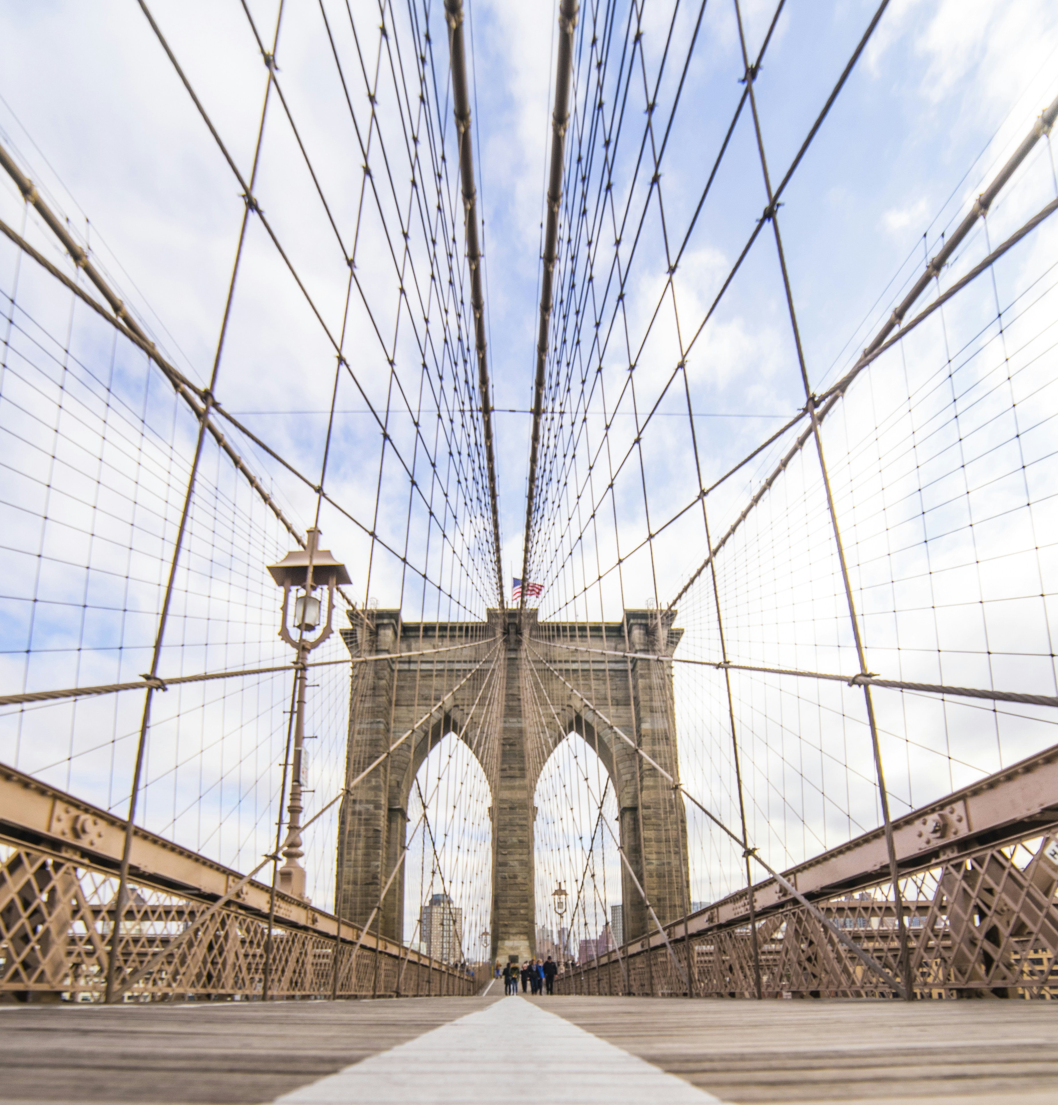people walking at Brooklyn Bridge during daytime