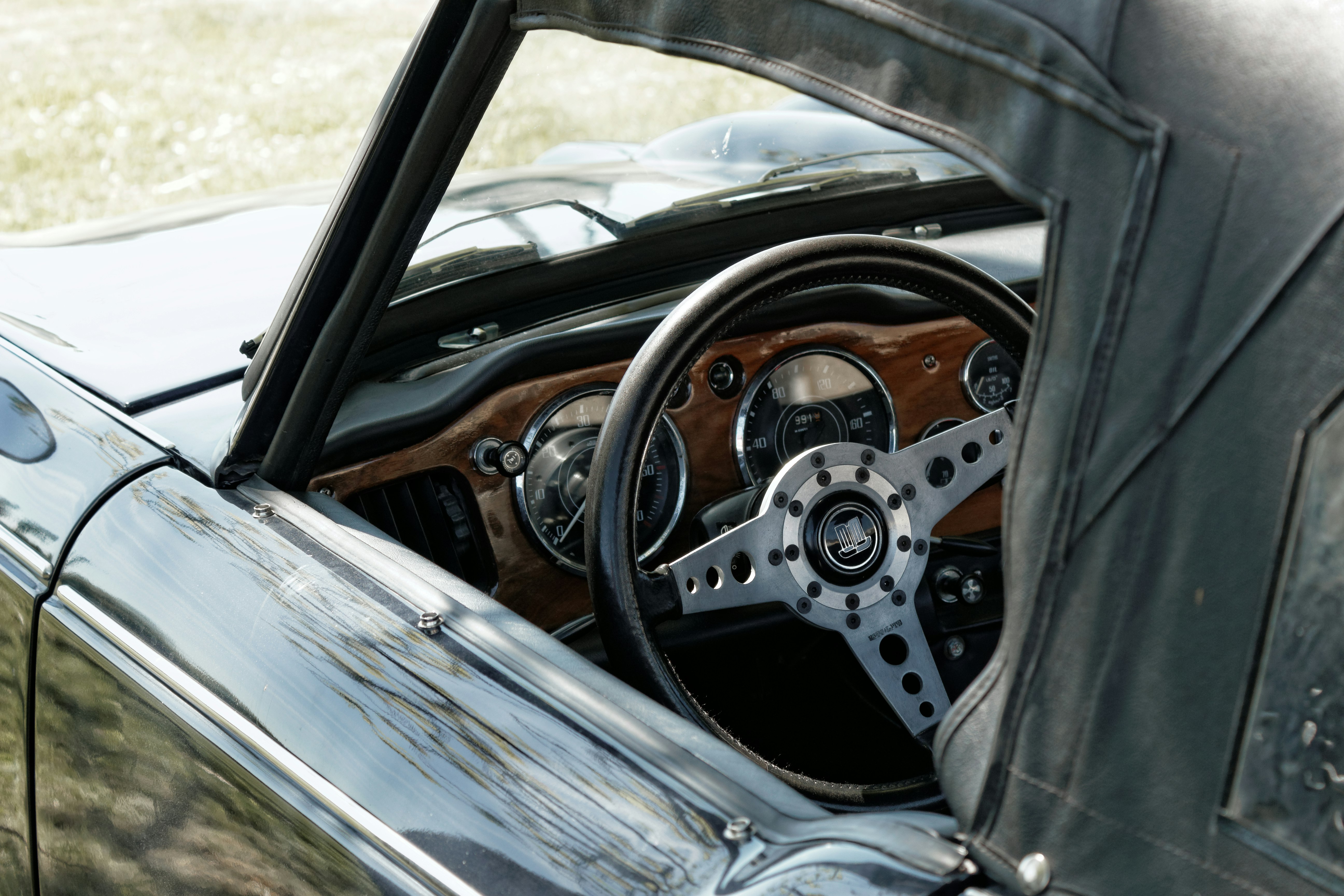 macro photography of car steering wheel