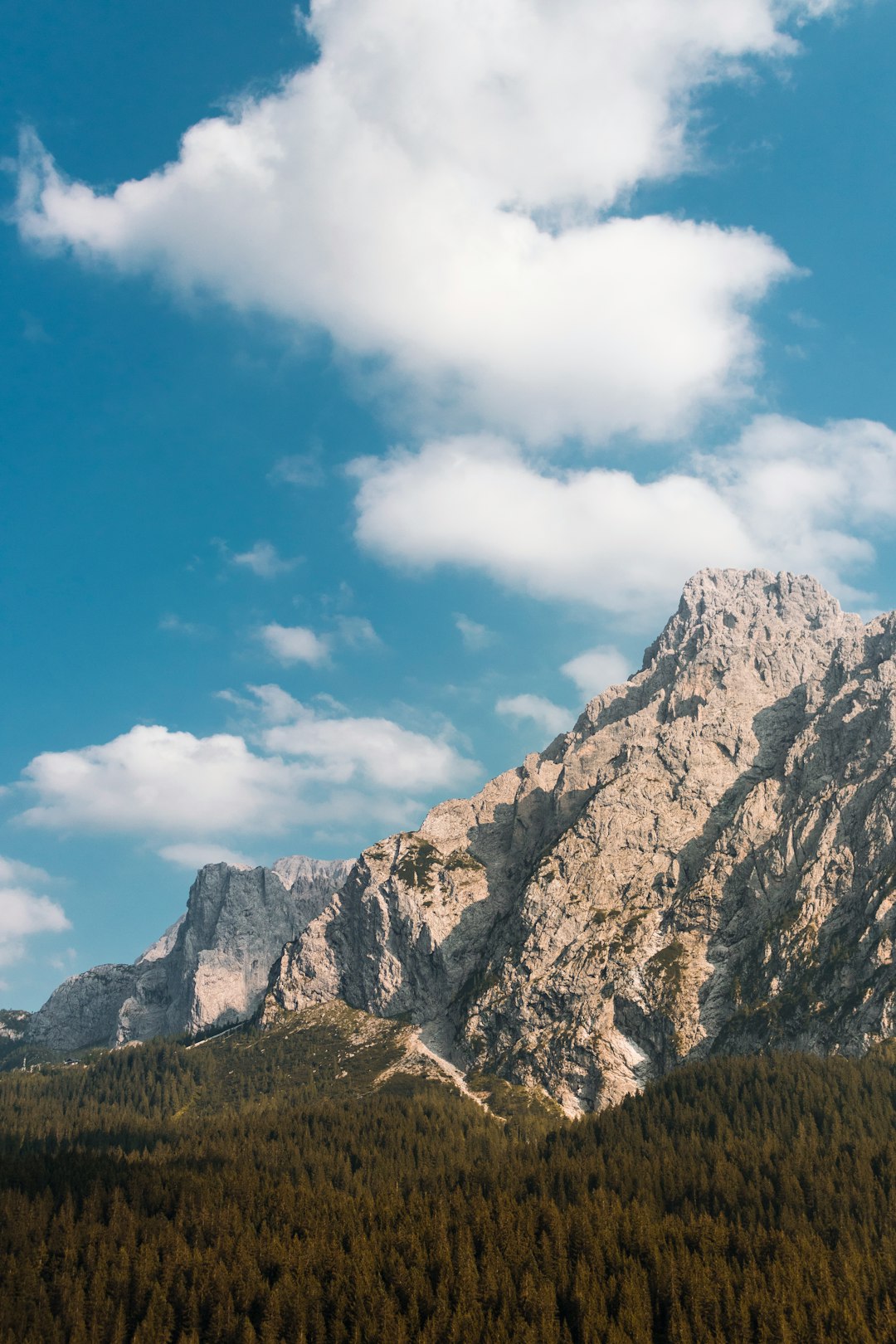 gray rock mountain under blue sky