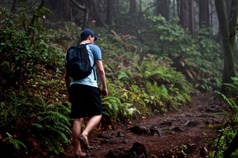 man walking on mountain