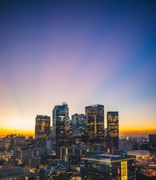 city buildings during sunset