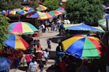 Colorful beach umbrellas and lively market stalls in Puerto Vallarta.