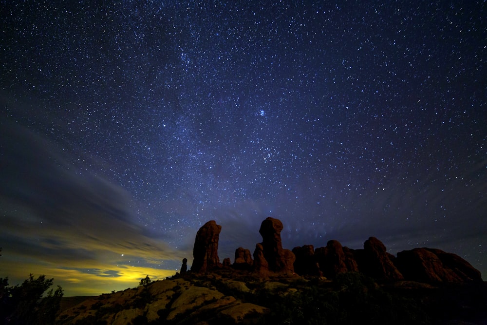 photograph of sky over rock formations