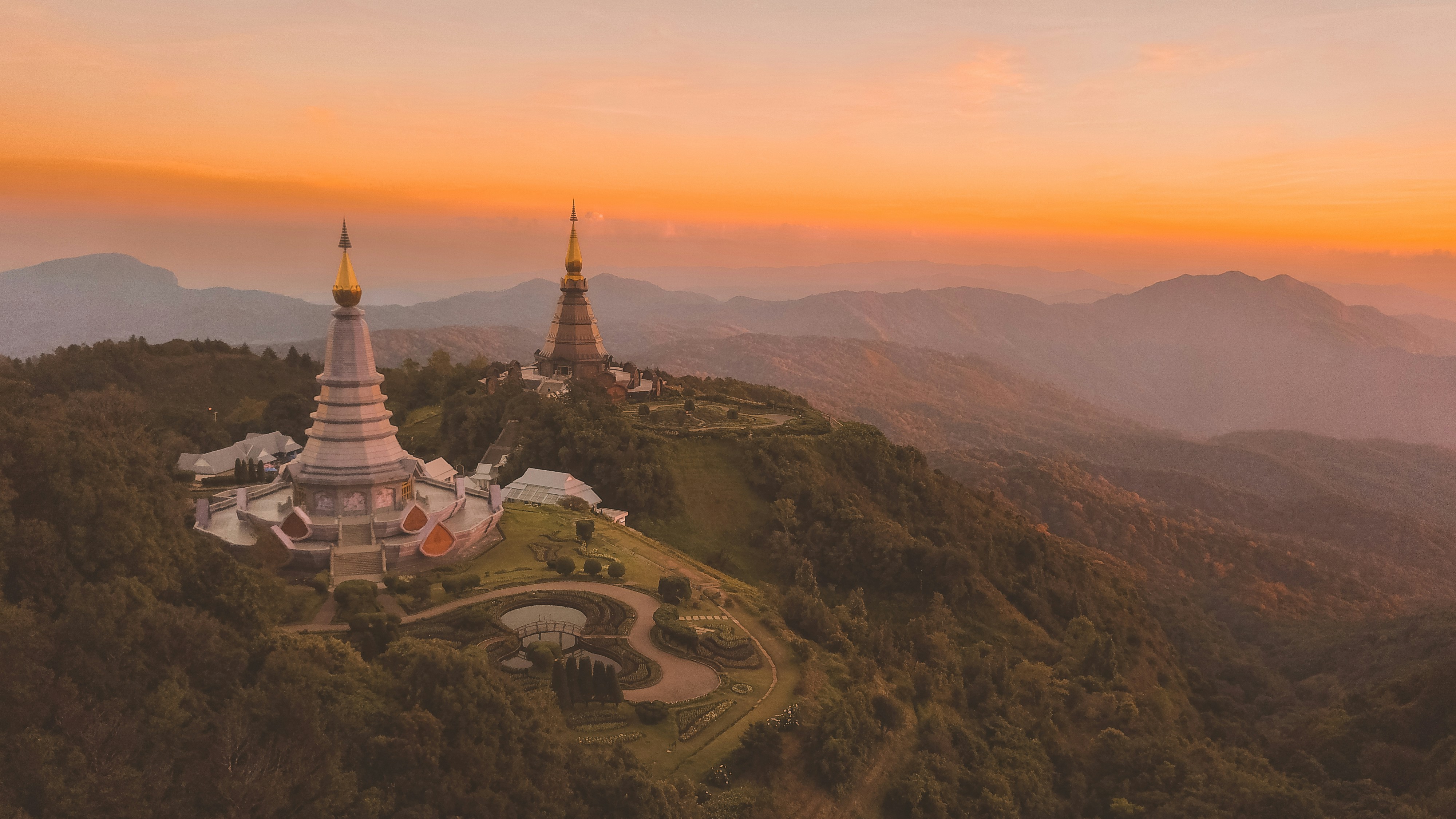 Biking hundreds of kilometers through the mountains to see sunsets like this was something I’ll never forget.\r
\r
For your next trip to Thailand, skip the beach parties and head up north. Rent a bike and explore all the small villages along the way. Meet the locals who have nothing but smiles or their faces and gorge on all the Khao Soi you can find.\r
\r
Thailand, till we meet again.