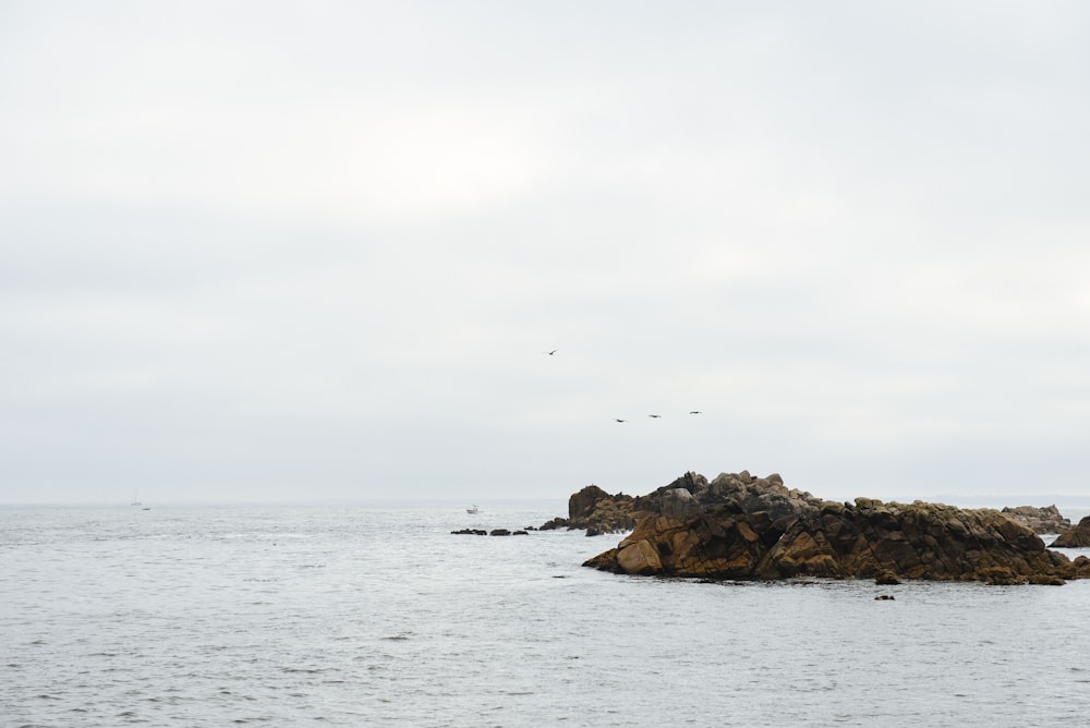 body of water between rocks