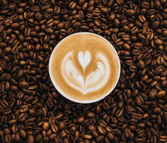 top view photography of heart latte coffee