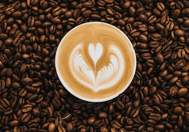 top view photography of heart latte coffee