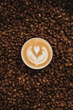 top view photography of heart latte coffee
