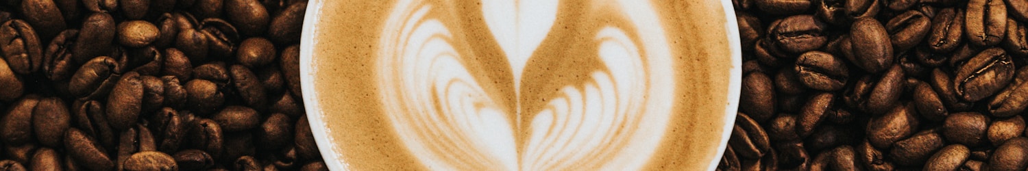 top view photography of heart latte coffee