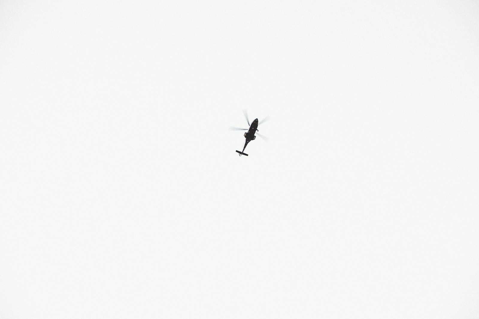 Fujifilm X-T1 + Fujifilm XF 16-55mm F2.8 R LM WR sample photo. Black helicopter on sky photography