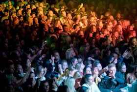 people standing near stage
