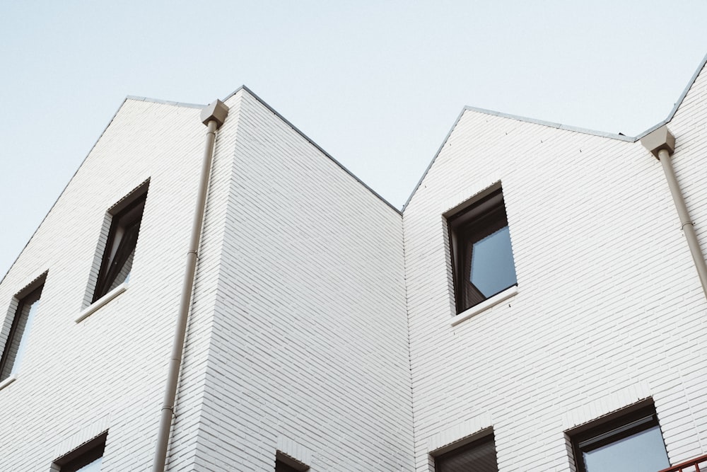 worm's eye-view of white concrete house