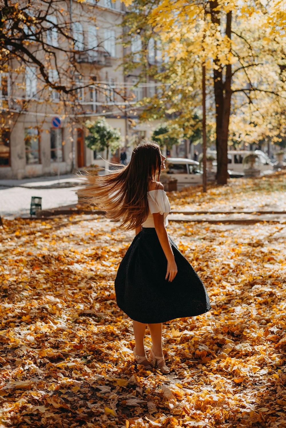 woman standing while hair waving by the wind