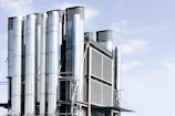 photo of grey and black industrial buildings