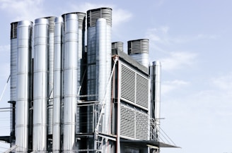 photo of grey and black industrial buildings
