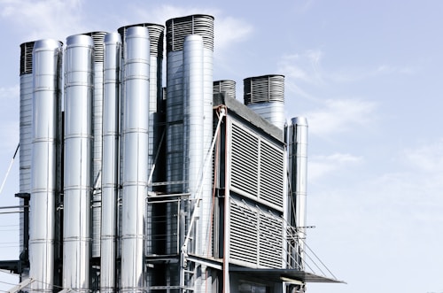 photo of grey and black industrial buildings