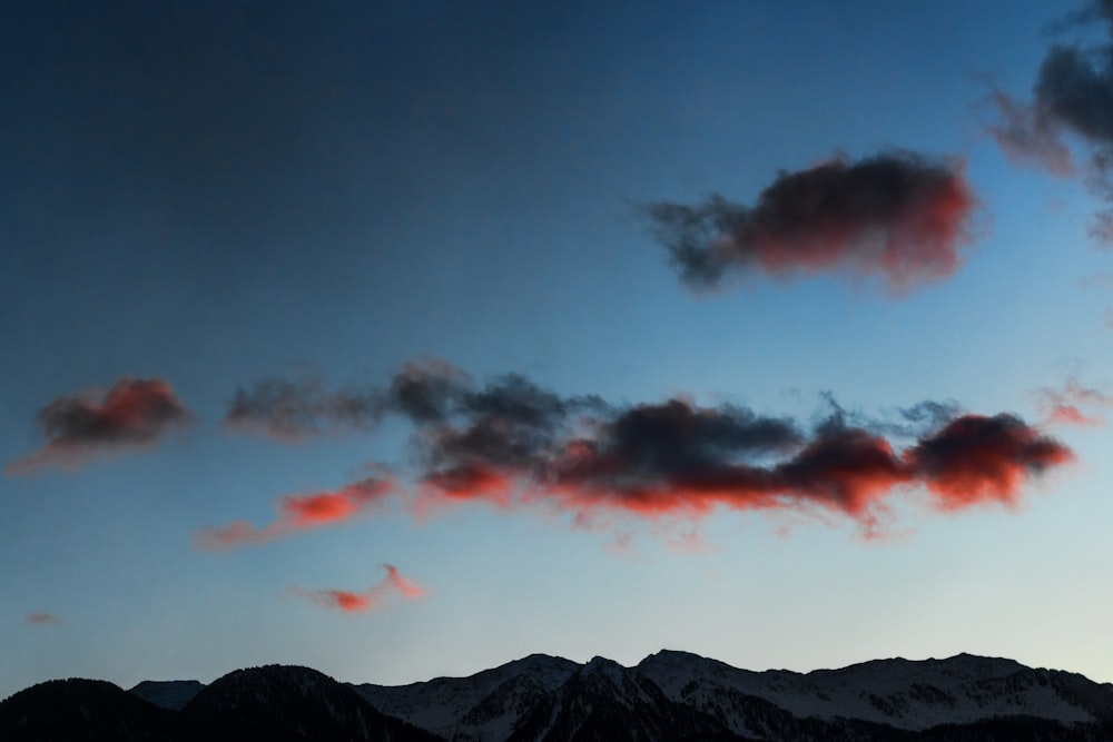 mountain under cloudy sky