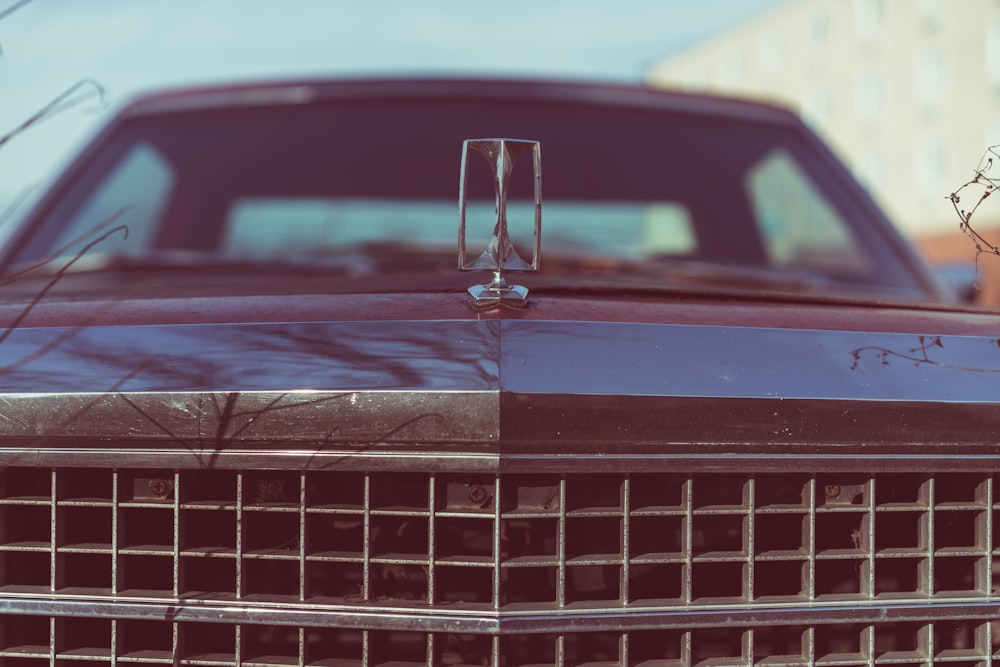 focus photography of black car