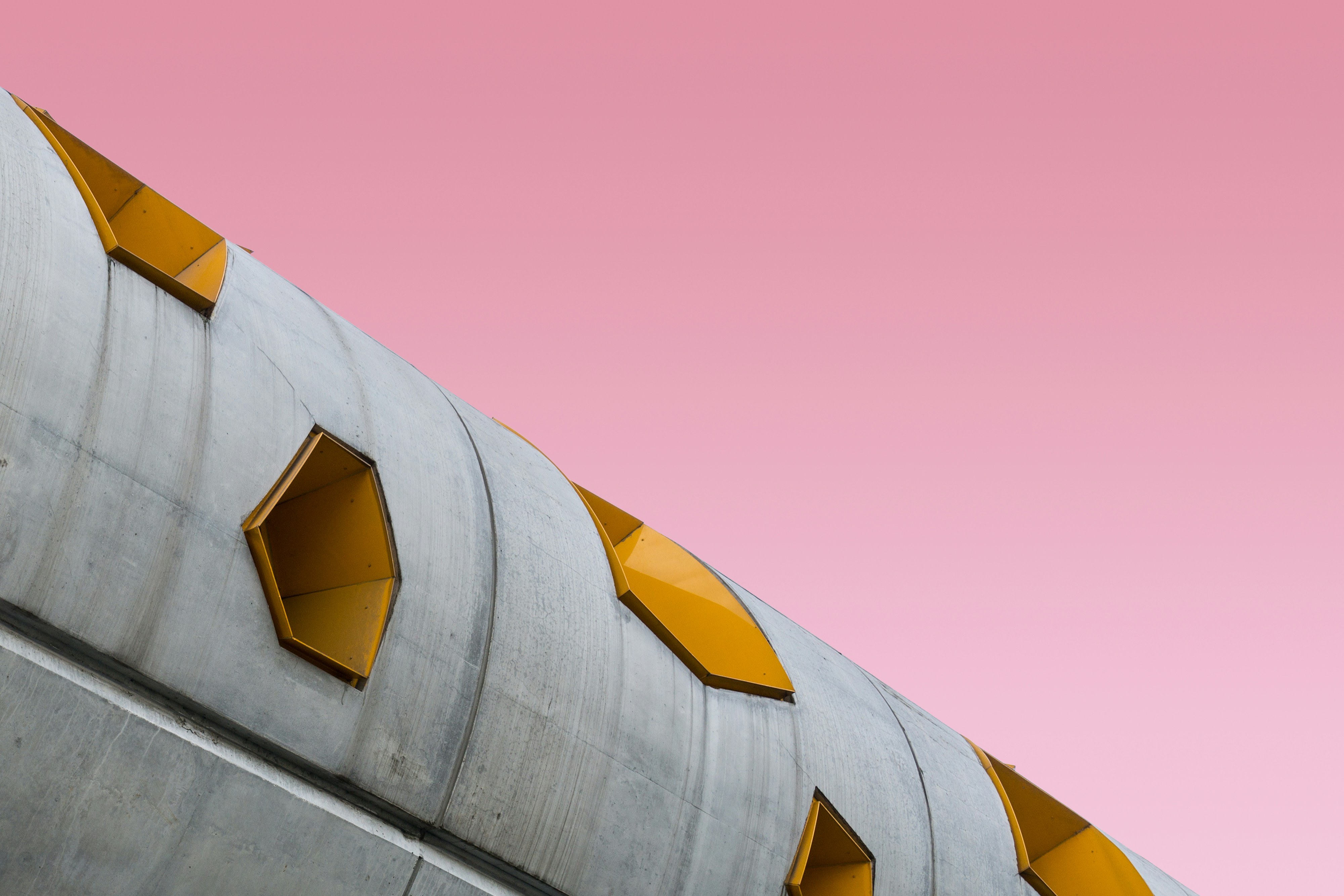 low angle photography of gray building, Pink concrete