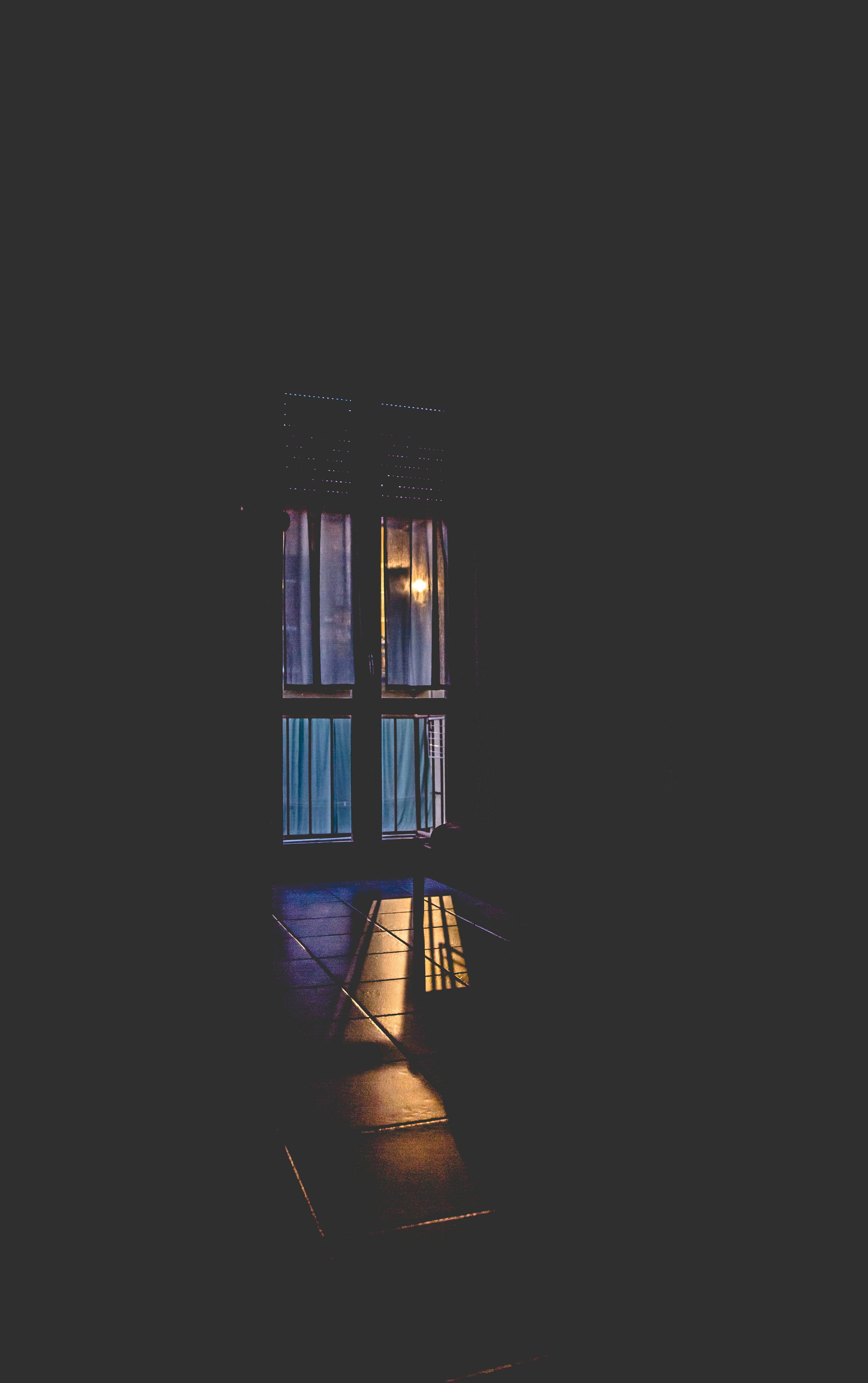 window during golden hour in dark room