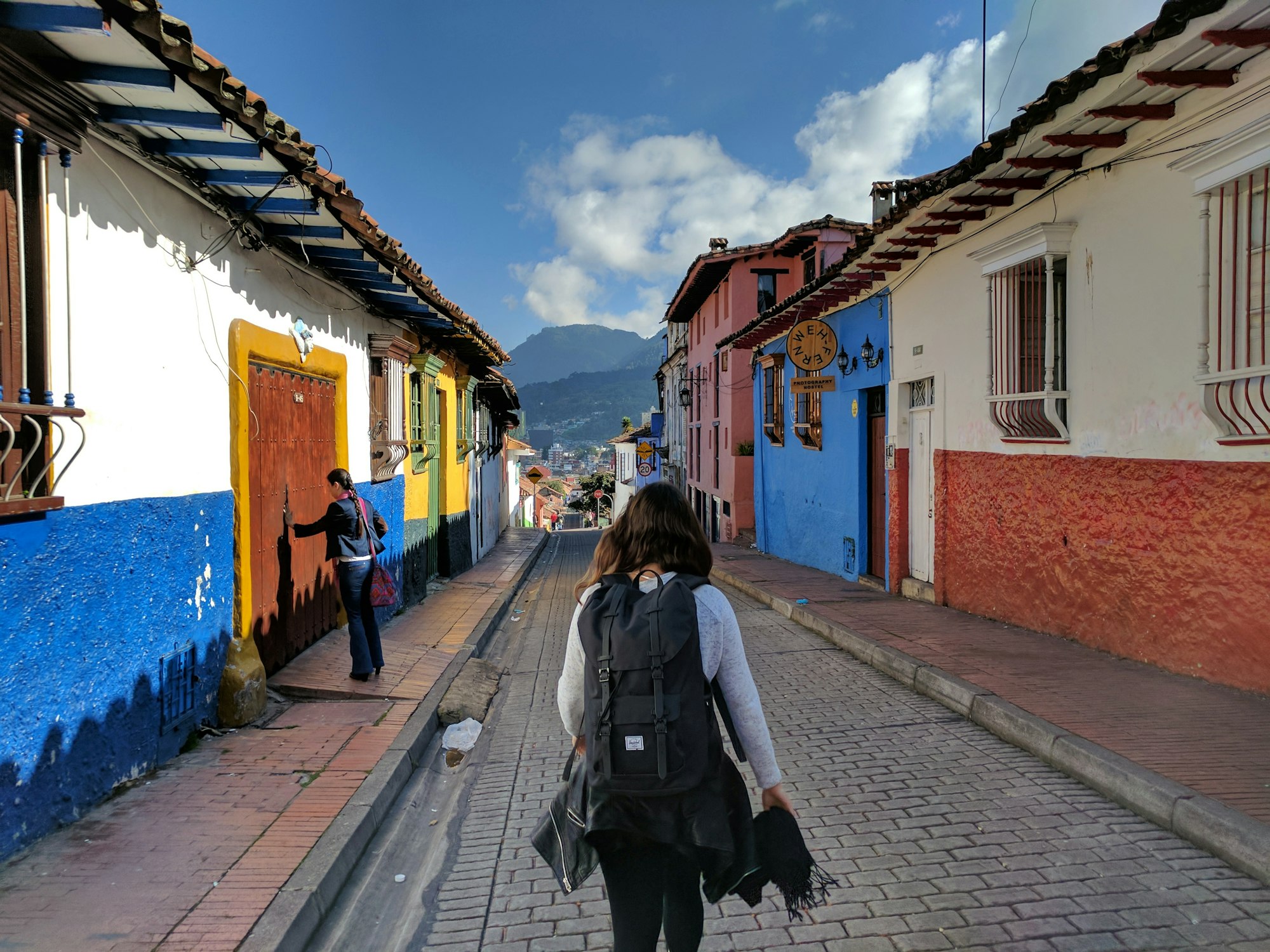 Woman walking on a street in South American