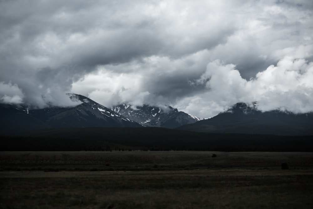 mountains covered by clouds