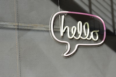 white hello led sign greetings teams background