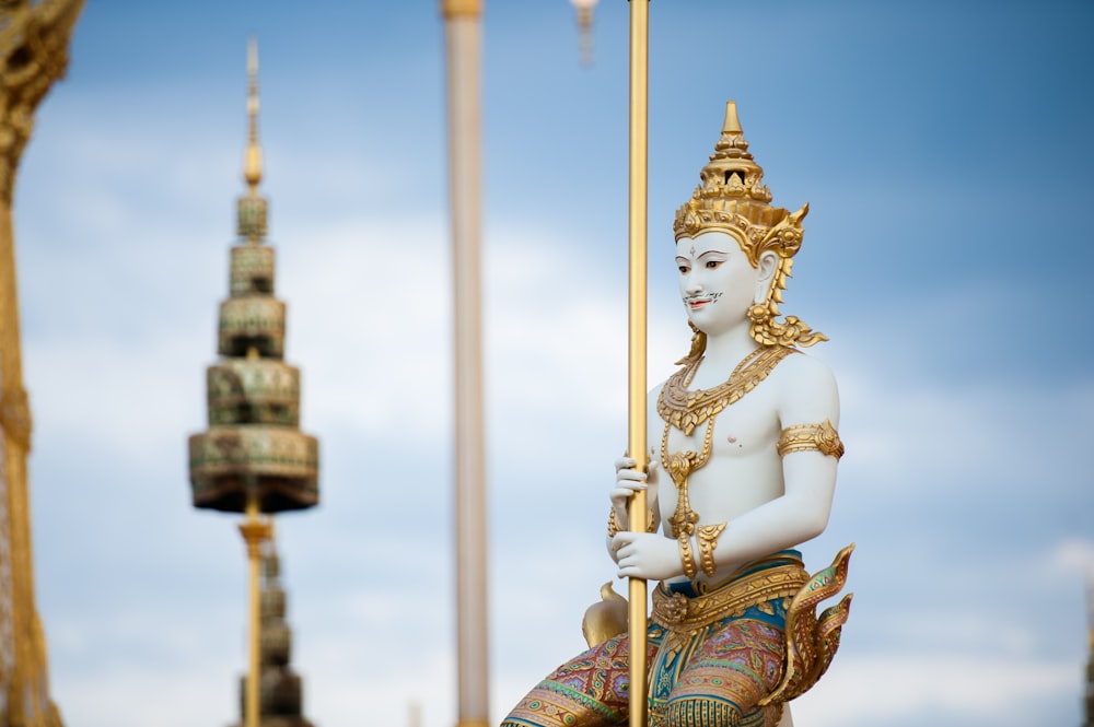 shallow focus photography of Hindu God statue