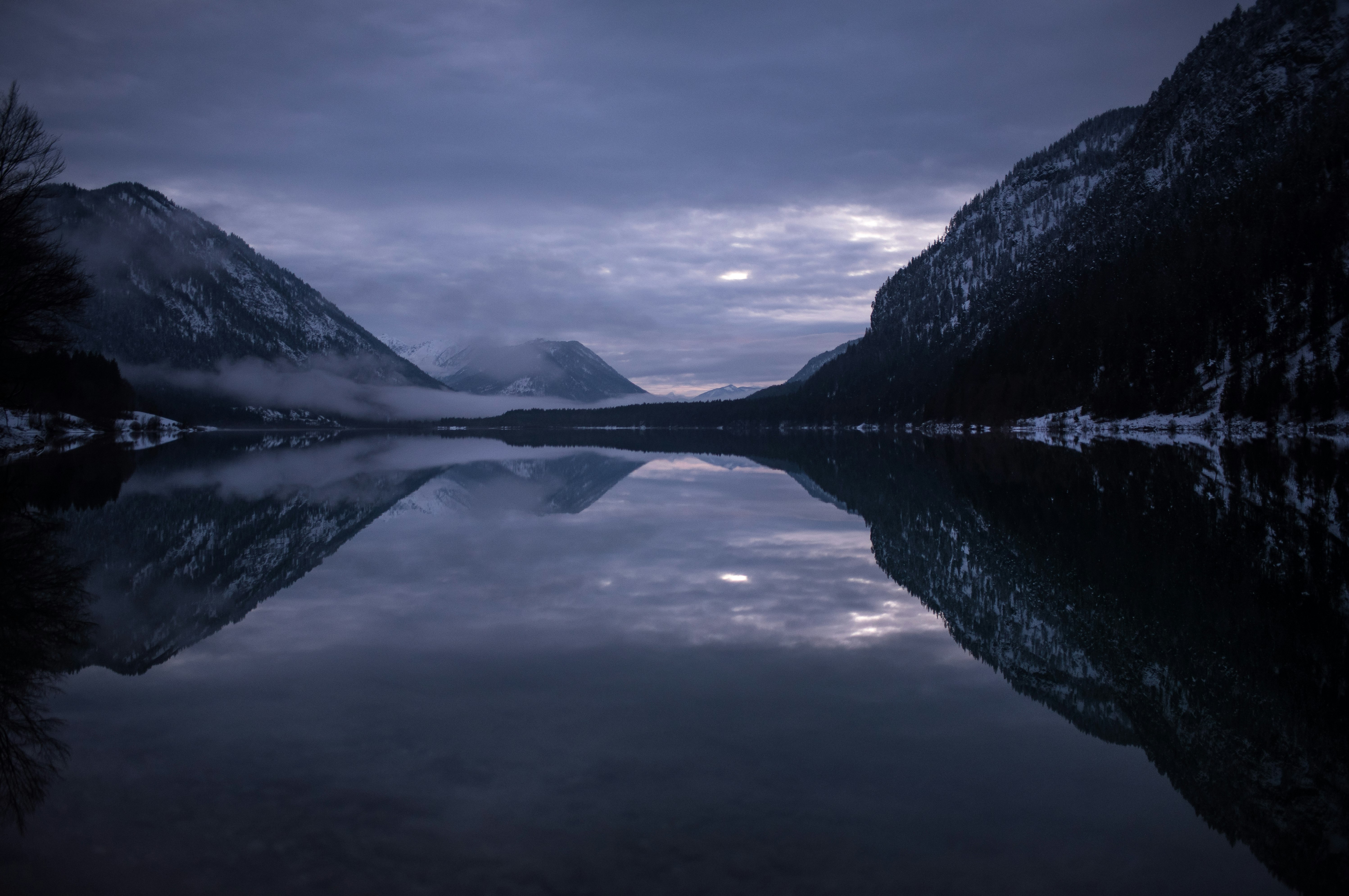 panoramic photography of body of water and mountains